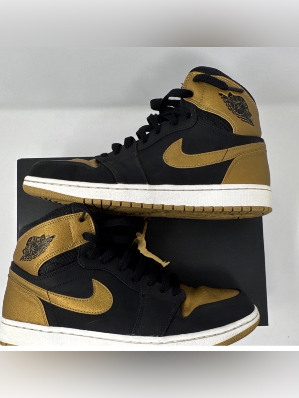Jordan Black and Gold High-Top Sneakers